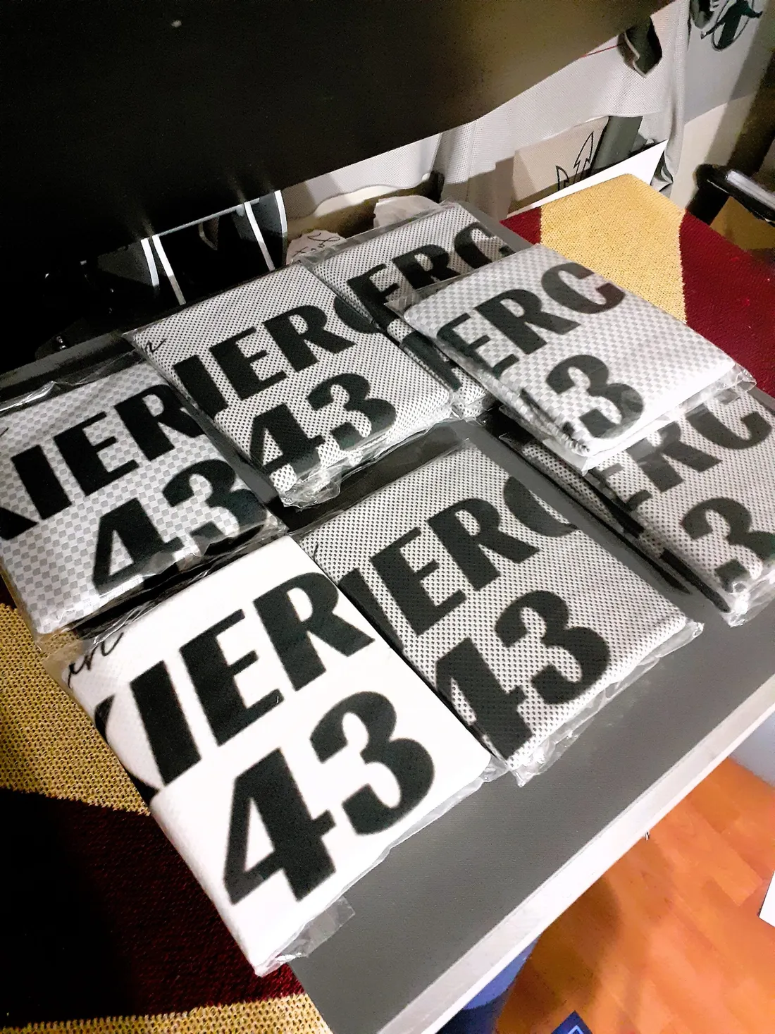Custom-printed DesertTowel cooling towels from a real team order
